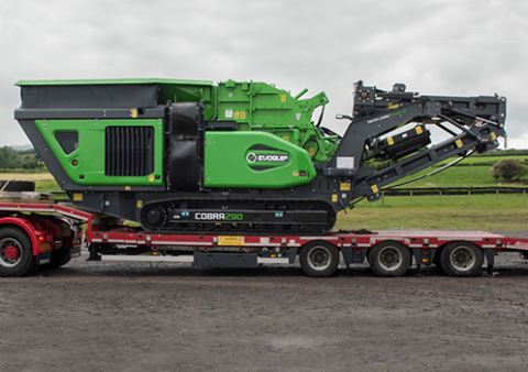  Cobra 290 being transported on a truck bed